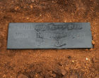 Engraved stone with details of the Dig burried in the site