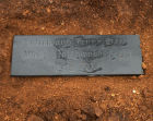 Engraved stone with details of the Dig burried in the site